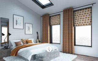 Matching patterned curtains and roman blinds