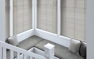 White venetian blinds near staircase