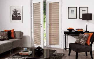 Beige perfect fit blinds in white door